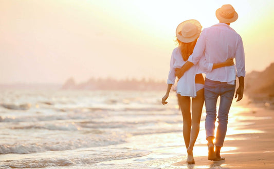 Happy Couple Walking on Beach after using Ashwagandha