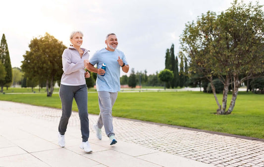 Older couple walking and aging gracefully with AgeEnvy's 5HTP supplements